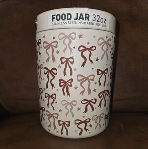 Cream Colored Jar with Brown Bow Design